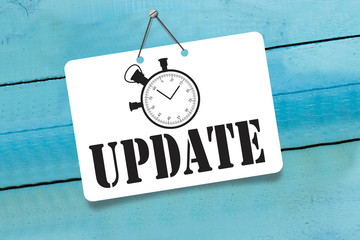 Update sign on wooden background