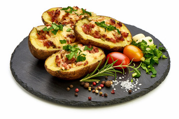 Wall Mural - Hot Baked stuffed Potatoes with cheese, bacon, parsley, close-up, isolated on white background