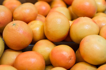 orange fresh fruits background texture market counter place food concept photography