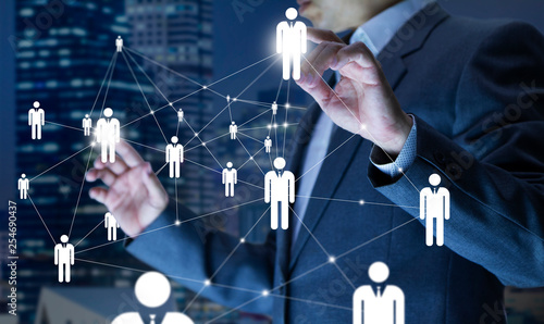 Cuadros en Lienzo Business administrator in action of manpower or human resource planning or business organisation on a virtual dashboard