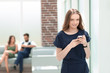 © yurolaitsalbert - young woman uses her smartphone in the office
