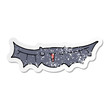 © lineartestpilot - distressed sticker of a cartoon bat