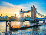 Fototapeta Londyn - Beautiful landscape with the famous landmark of London, Tower Bridge reflected in the Thames river in sunset light in UK