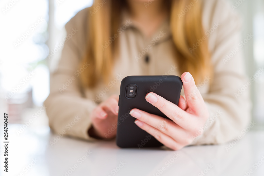 Close up of woman using smartphone