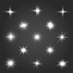 Wall Mural - A set of bright beautiful stars. Light effect. Bright Star. Beautiful light for illustration. Christmas star.White sparkles shine special light effect. Vector sparkles on a transparent background