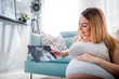 © leszekglasner - Pregnant woman looking her baby on ultrasound image, usg photo