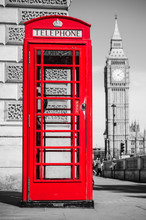 London's Iconic Telephone Booth With The Big Ben Clock Tower In The Background
