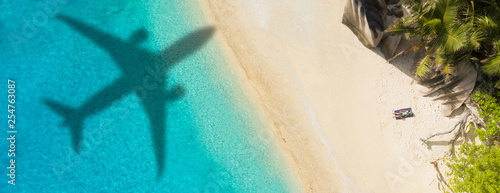 Concept of airplane travel to exotic destination Poster Mural XXL