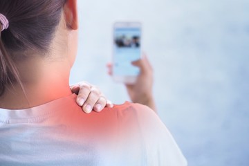 Pain in the shoulder area , Because holding the phone for a long time.