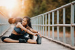 © sutadimages - Couple jogging and running , Fitness couple stretching outdoors, Young man and woman exercising together.