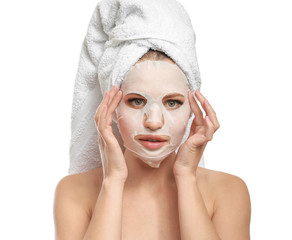 Sticker - Beautiful young woman with sheet facial mask on white background