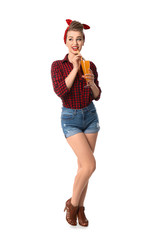 Poster - Beautiful pin-up woman with cocktail on white background