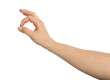 © Pixel-Shot - Male hand holding something on white background