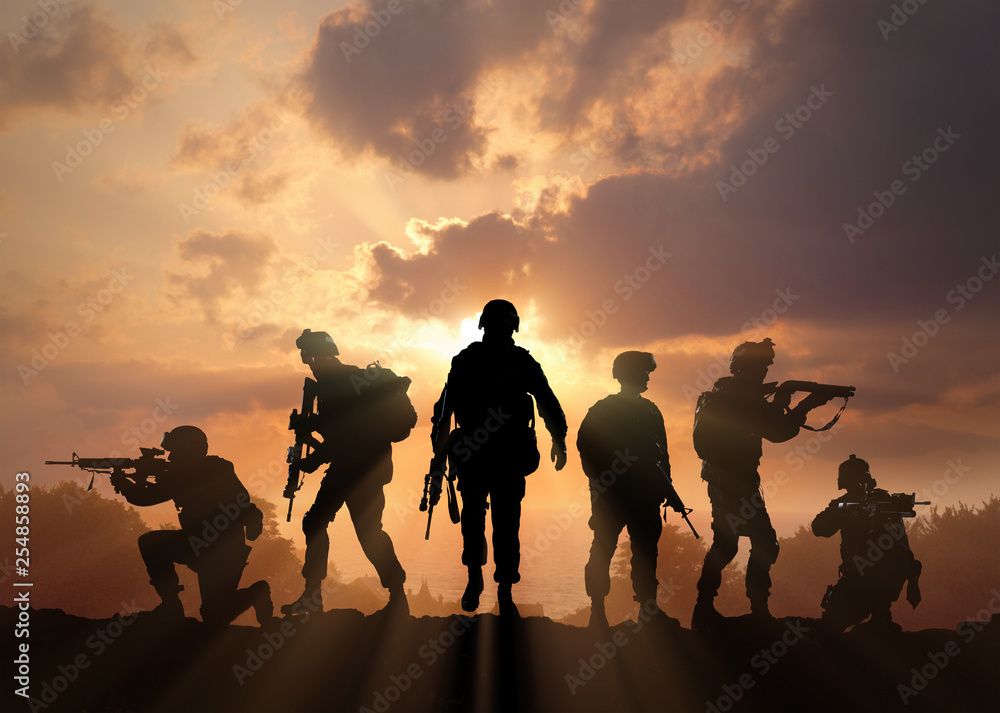 Six military silhouettes on sunset sky background - obrazy, fototapety, plakaty 
