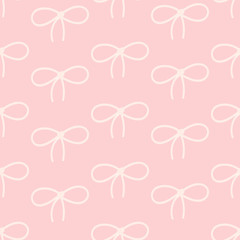  Cute seamless pattern with bows in pink tones.