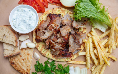 Shawarma, gyros pita. Traditional turkish, greek meat food on pita bread