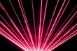 Red laser show nightlife club stage and shining sparkling rays. Luxury entertainment in nightclub event, festival, concert or New Years Eve. Ray beams are symbol for science and universe research