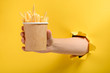 © yuriygolub - Hand taking French fries