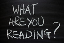 The Question What Are You Reading Written By Hand In White Chalk On A Blackboard