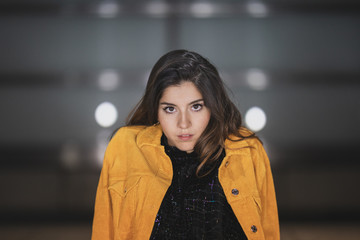 Wall Mural - portrait of young woman in the city