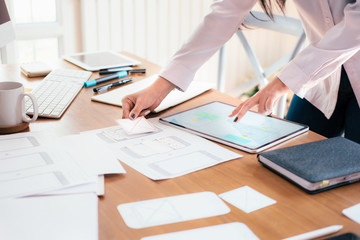UX UI designer designing mobile application user interface.