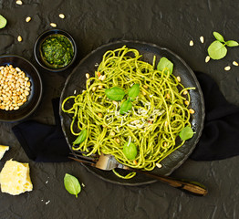 Wall Mural - Spaghetti with pesto of arugula with pine nuts