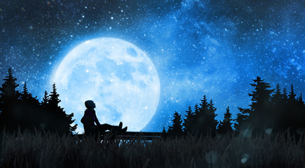 Girl watching the stars in night sky