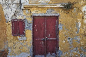 Yellow old house on the street of the city of Rhodes Greece