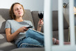 © JackF - Woman relaxing at home watching TV