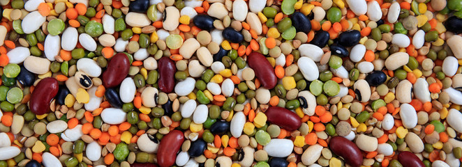 Sticker - Mixed dry uncooked legumes full background, banner