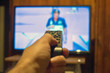 © gpetric - Watching TV and using remote controller