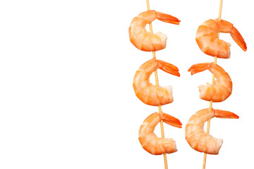 Wall Mural - shrimps skewers isolated on a white background. top view