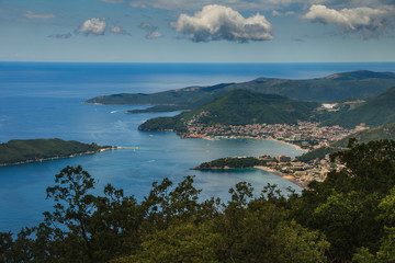 Wall Mural - Panoramic landscape of Budva riviera in Montenegro. Balkans, Adriatic sea, Europe. View from the top of the mountain.