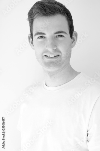 Handsome Man Looking And Camera And Smiling Posing For A Portrait