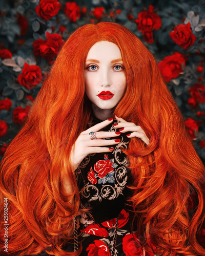 Young Redhead Girl With Very Long Wavy Hair In Dress With