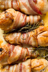 Canvas Print - roasted bacon wrapped chicken legs