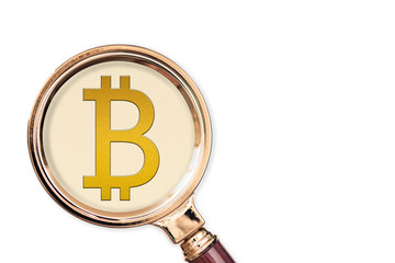 .Icon bitcoin under a magnifying glass. Сoncept of the main international currency