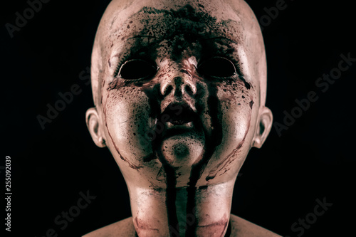 Creepy bloody doll in the dark Poster Mural XXL