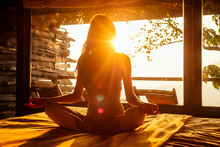 Woman Sun Rays In The Form Of Chakras In Tropical Yoga Studio A View Outside To The Hills While Sunset.girl In Eco Hotel Panoramic Windows Enjoying Solitude With Nature Kerala India Wildernest Resort