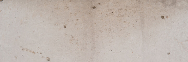 Sticker - gray cement plaster on the wall of the house.