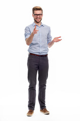 Wall Mural - full length portrait of young man standing on white background