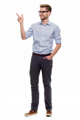 Wall Mural - full length portrait of young man pointing