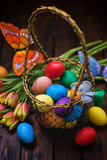 Fototapeta Tulipany - Easter background with tulips and painted eggs 