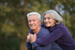 © aletia2011 - Portrait of cute senior couple in autumn park
