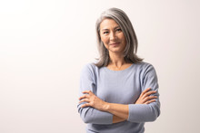 Beautiful Grey-haired Woman With Crossed Arms