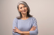 © Svyatoslav Lypynskyy - Beautiful Mongolian Woman with Gray Hair on a White Background.