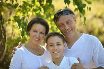 Sticker - Portrait of happy family in summer park