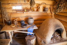 Kitchen In The Old Peasant Log Cabin