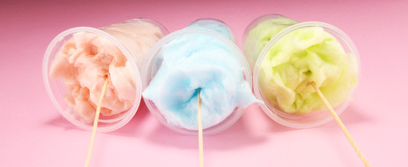 Wall Mural - colorful cotton candy floss. sweet party food in pink and green