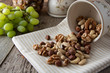 © Inga - Nuts mix over wooden background. Energy super food. Proteine food. dieting, healthy food. Isolated nuts - almonds, hazelnuts,cashew, brazil nuts.